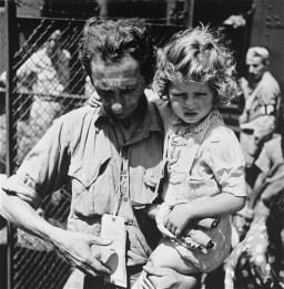 Jewish refugees from Europe arrive at the emergency refugee shelter at Fort Ontario. [LCID: 60010c]