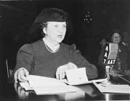 Secretary of Labor Frances Perkins testifies before the House Committee on migrant workers. Washington D.C., December 1940. 
 