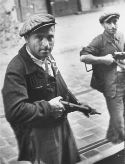 Two partisans during the uprising before liberation. [LCID: 63700]