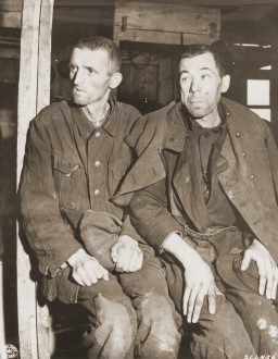 Two malnourished Soviet prisoners of war, survivors of the Hemer prisoner of war camp in western Germany. [LCID: 37308]