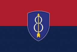 A digital representation of the United States 8th Infantry Division's flag. 
The US 8th Infantry Division (the "Golden Arrow" or "Pathfinder" division) was established in 1918 and fought in World War I. During World War II, they captured the cities of Rennes and Brest. The division also encountered Wöbbelin, a subcamp of Neuengamme. The 8th Infantry Division was recognized as a liberating unit in 1988 by the United States Army Center of Military History and the United States Holocaust Memorial Museum (USHMM). 