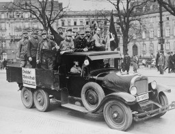 Sign on truck carrying Storm Troopers (SA) urges "Germans! [LCID: 19599]