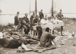 Wounded Soviet prisoners of war await medical attention. [LCID: 67670]