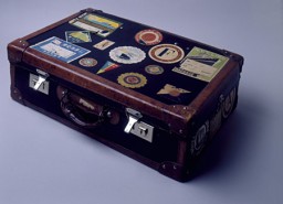 A few Polish Jewish refugees left Japan to join a small Jewish community in Harbin, Manchuria, in Japanese-occupied China. One of them carried this suitcase, covered with stickers from various shipping firms and hotels, on the journey to Harbin. China, 1940-1941. [From the USHMM special exhibition Flight and Rescue.]