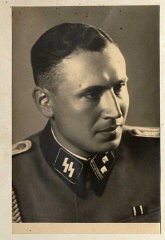 Obersturmführer Karl Höcker, June 21, 1944.
Karl Höcker, adjutant to the commandant of Auschwitz, kept a photograph album. The album includes both documentation of official visits and ceremonies at Auschwitz as well as more personal photographs depicting the many social activities that he and other members of the Auschwitz camp staff enjoyed. These rare images show Nazis singing, hunting, and even trimming a Christmas tree. They provide a chilling contrast to the photographs of thousands of Hungarian Jews deported to Auschwitz at the same time. 