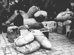 在苏台德地区被德国吞并后，该地区的难民到达布拉格。