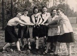 Regina (third from left) with friends while at the Dueppel displaced persons camp. Berlin, Germany, May 20, 1946.