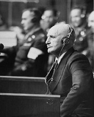 Defendant Julius Streicher, editor of the antisemitic newspaper Der Stürmer, on the stand at the International Military Tribunal trial of major war criminals at Nuremberg. April 29, 1946.
