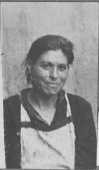 Portrait of Sara Israel, wife of Isak Israel. She lived at Krstitsa 10 in Bitola.
This photograph was one of the individual and family portraits of members of the Jewish community of Bitola, Macedonia, used by Bulgarian occupation authorities to register the Jewish population prior to its deportation in March 1943.