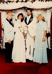 Photograph taken at the marriage of Esther Salsitz and her fiance. Esther's parents, Norman and Amalie, stand at left and right (respectively). June 19, 1977.
With the end of World War II and collapse of the Nazi regime, survivors of the Holocaust faced the daunting task of rebuilding their lives. With little in the way of financial resources and few, if any, surviving family members, most eventually emigrated from Europe to start their lives again. Between 1945 and 1952, more than 80,000 Holocaust survivors immigrated to the United States. Norman was one of them. 