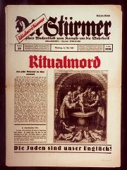 나치의 발행물 중 가장 인기가 많았던 돌격대(Der Stürmer)의 첫장 , 유태인이 종교의식으로서 살인을 저지른다고 알려진 중세의 서술을 싣고있다..