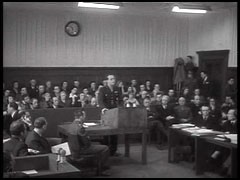 In the Justice Case of the Subsequent Nuremberg Proceedings, nine officials from the German Ministry of Justice and seven members of the Nazi-era People's and Special Courts were charged with “judicial murder and other atrocities, which they committed by destroying law and justice in Germany, and then utilizing the emptied forms of legal process for the persecution, enslavement and extermination on a large scale.” This footage shows US prosecutor Telford Taylor describing the defendants.