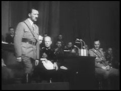The film "The Nazi Plan" was shown as evidence at the International Military Tribunal in Nuremberg on December 11, 1945. It was compiled for the trial by Budd Schulberg and other US military personnel, under the supervision of Navy Commander James Donovan. The compilers used only German source material, including official newsreels. In this footage titled "Seventh Party Congress 10–16 September 1935," Hermann Göring announces restrictive racial laws.