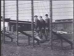 [This video is silent]
There were three large forced-labor camps in Hannover, a large industrial city in northern Germany. All three of the camps were part of the Neuengamme concentration camp system. In early April 1945, American forces entered Hannover and freed the surviving prisoners. The American Signal Corps filmed one of the Hannover camps soon after liberation. American forces fed survivors of the camp and required German civilians to help bury the dead.