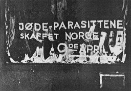 Antisemitic graffiti on a shop window: "The Jewish parasite sold Norway on the 9th of April [The day of the German invasion in 1940]. [LCID: 88996]