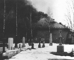 A Norwegian town  burns after a German bombing mission