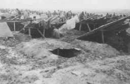 Dugouts which served as living quarters for prisoners in Stalag 319—a Nazi-built camp for Soviet prisoners of war. Chelm, Poland,1941–44.
