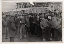 Men in the Ziegenhain displaced persons (DP) camp demonstrate on behalf of free immigration to Palestine, circa 1945 1948. Their banner expresses their wish to go to Israel.