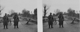 Two German sentries stand guard at Augustow on the demarcation line between Soviet- and German-occupied Poland. [LCID: 09868]