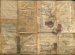 The back of Samuel Soltz's citizenship papers illustrates the vast array of bureaucratic stamps and visas needed to emigrate from Europe in 1940–41. The stamp in the top left, dated August 21, 1940, represents a visa from the Japanese consul to Lithuania, Chiune Sugihara. Sugihara issued thousands of visas to enable Jews to escape.
 