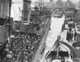 Destroyers of the Royal Navy carry British troops evacuated from Dunkirk. Dover, England, May 31, 1940. IWM (H 1640)