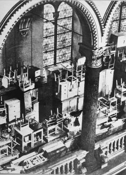 Property confiscated from deported Jews is stacked in a synagogue. [LCID: 80596]