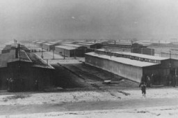 View of barracks in the women's camp in the Auschwitz-Birkenau killing center in German-occupied Poland, 1944.