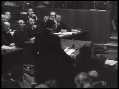 In the summer of 1945, representatives of the victorious Allied nations—the United States, Great Britain, France, and the Soviet Union—met in London to discuss the formation of an International Military Tribunal. The questions on the table were daunting: how and where such a court would convene, what the criminal charges would be, and which perpetrators would be put on trial. US President Harry S. Truman issued an executive order designating Supreme Court Justice Robert H. Jackson to be the US representative and chief prosecutor. This film clip contains part of Jackson's opening statement to the International Military Tribunal.