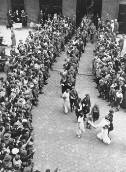 A group of 50 Nazi couples getting married