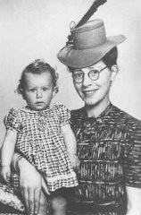 Semmy Woortman-Glasoog with Lientje, a 9-month-old Jewish girl she hid. Woortman-Glasoog was active in a network which found foster homes, hiding places, and false papers for Jewish children. She was later named "Righteous Among the Nations." Amsterdam, the Netherlands, between 1942 and 1944.