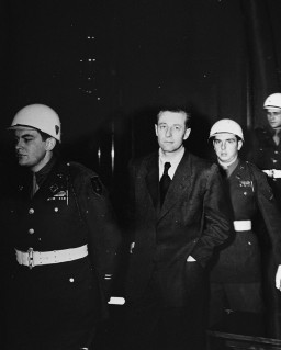 Hans Fritzsche enters the courtroom