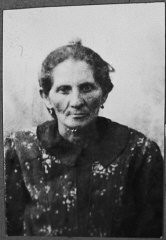 Portrait of Hana Ergas, wife of Isak Ergas. She lived at Zmayeva 20 in Bitola.
This photograph was one of the individual and family portraits of members of the Jewish community of Bitola, Macedonia, used by Bulgarian occupation authorities to register the Jewish population prior to its deportation in March 1943.
