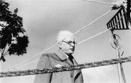 Jewish council chairman Mordechai Chaim Rumkowski delivers a speech. [LCID: 86228]