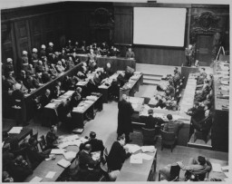 View of the courtroom during the International Military Tribunal proceedings in Nuremberg, showing screen upon which films were projected.
