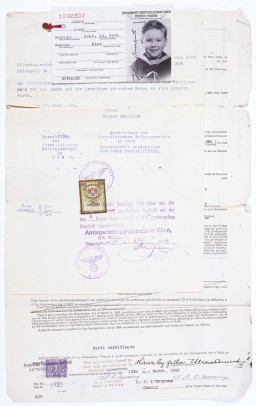 Birth certificate, US immigration visa application, and identification card issued to Hans Ament, born in Vienna, Austria, in 1934.