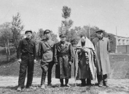 Kovno ghetto survivors gather at a former killing site