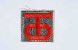 Insignia of the 90th Infantry Division. Called the "Tough Ombres," the 90th Infantry Division was raised from draftees from the states of Texas and Oklahoma during World War I. The divisional insignia incorporates the letters "T" and "O" to symbolize both states. These letters later yielded the nickname "Tough Ombres," symbolizing the esprit de corps of the unit. The 90th was also sometimes called the "Alamo" division during World War II.