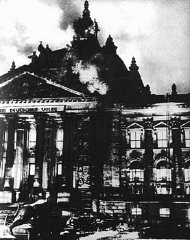 The Reichstag (German parliament) building burns in Berlin. Hitler used the event to convince President Hindenburg to declare a state of emergency, suspending important constitutional safeguards. Germany, February 27, 1933.