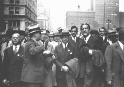 Dr. Bernard Deutsch, president of the American Jewish Congress (center) and Rabbi Stephen S. Wise (right) participate in a mass demonstration against Nazi treatment of German Jews. The demonstration took place on the same day as the book burnings in Germany. New York, United States, May 10, 1933.