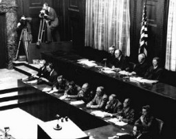 American judges (top row, seated) during the Doctors Trial, case #1 of the Subsequent Nuremberg Proceedings. Presiding Judge Walter B. Beals is seated second from the left. Nuremberg, Germany, December 9, 1946–August 20, 1947.