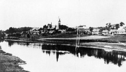 View of the village of Chelmno. To the left of the church is the Schloss, one of two sites of the Chelmno camp. The Schloss, an old country estate, served as the reception and killing center for victims until it was demolished in April 1943. Chelmno, Poland, 1939–1943.