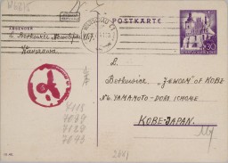 Front of a postcard with handwritten details in black ink and pencil. It features a purple decorative stamp in the top right corner and a red German stamp on the left side.