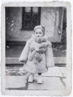 Portrait of three-year-old Estera Horn wrapped in a fur coat. [LCID: 58173]