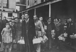 Jewish prisoners arrive at the Drancy transit camp. [LCID: 19111]
