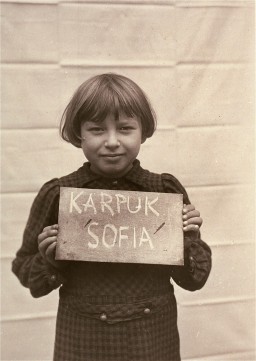 A girl in the Kloster Indersdorf children's center who was photographed in an attempt to help locate surviving relatives. [LCID: 86765]