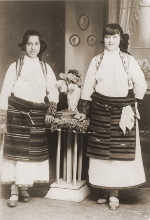 Portrait of two Jewish girls dressed in traditional Macedonian costume in a private home in Bitola.