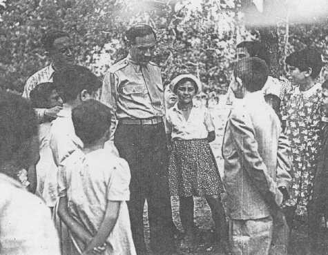 William Bein, director of the American Jewish Joint Distribution Committee (JDC) in Poland, with children at the Srodborow home for ... [LCID: 36028]