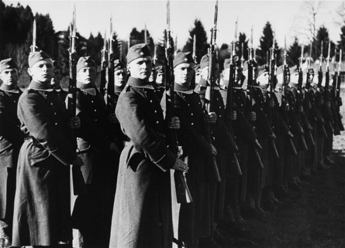 SS troops stand at attention for inspection. This image is from an album of SS photographs. Germany, 1936-1939.