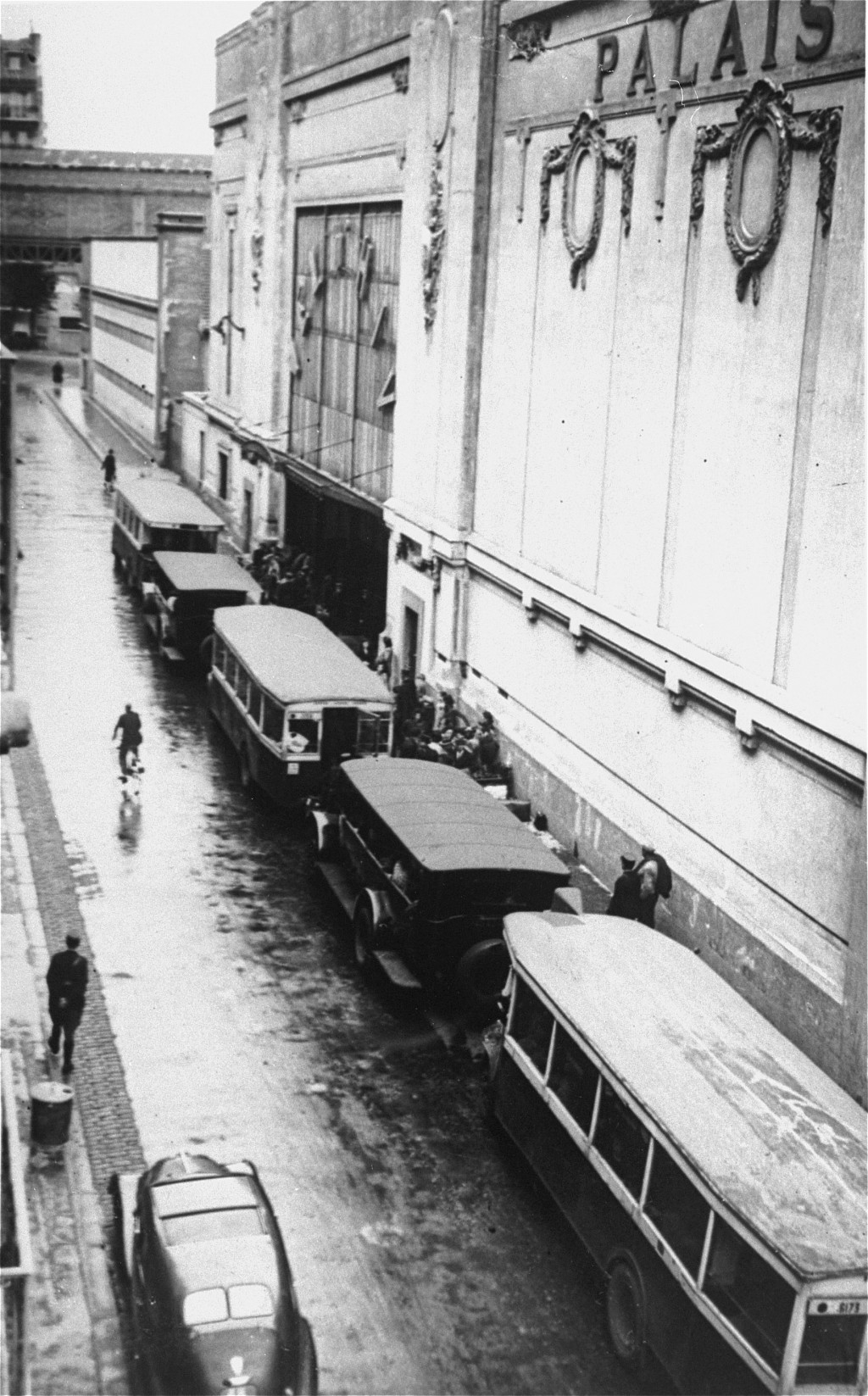 Buses waiting at the entrance to the Vélodrome d'Hiver, where almost 13,000 Jews were assembled before being transported to Drancy and other French transit camps.