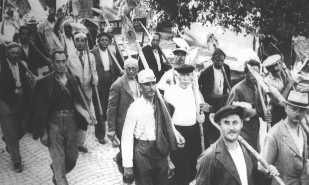 Jews drafted into the Hungarian Labor Service System march to a work site. [LCID: 65692]
